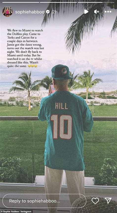 Sophie Habboo Flaunts Her Figure In A White Bikini And Crochet Sarong As She Soaks Up The Sun In