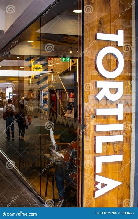 Tortilla Sign Against A Reflective Window Stock Photo Image Of