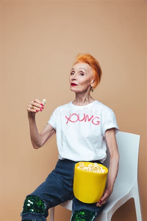 Mature Redhead Fashion Woman Blowing Kisses Stock Photo Image Of Blond European