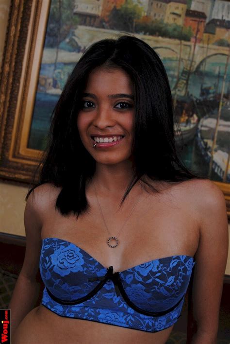 Cute Brunette Babe Takes Off Her Shirt And Shows Her Blue Bra Photos