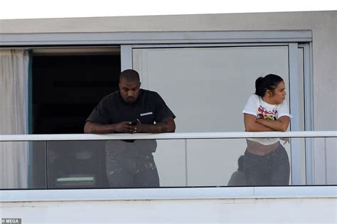 Kanye West Spotted With Mystery Girl On Hotel Balcony Before Almost Naked Woman Steps Out Of