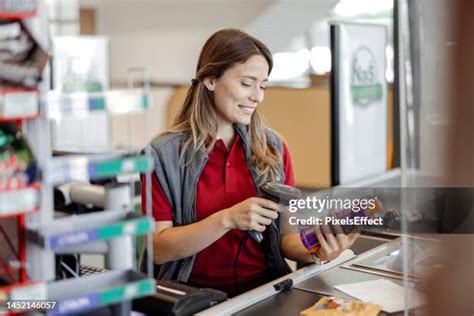 cashier counter scan   premium high res pictures getty images