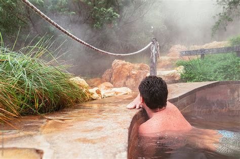 Man Relaxing In A Pool At A Hot Springs Resort By Stocksy Contributor Gillian Vann Stocksy