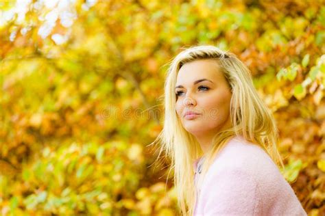 Blonde Woman Relaxing In Autumn Park Stock Photo Image Of Season Fall