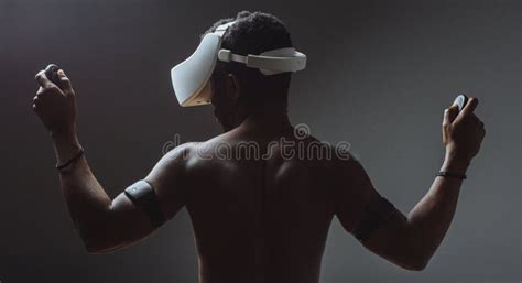 Backside Of African Male Muscular Athlet With Naked Torso Using Vr Headset Stock Image Image