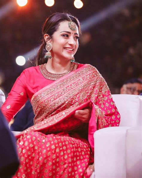 Trisha Krishnan glams up in a pink embroidered saree at "Ponniyin ...
