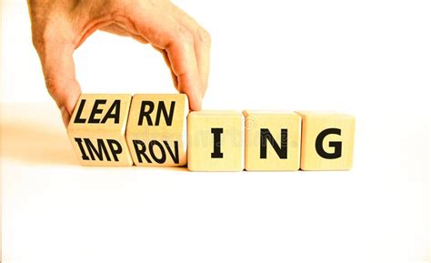 improving  learning symbol businessman turns wooden cubes