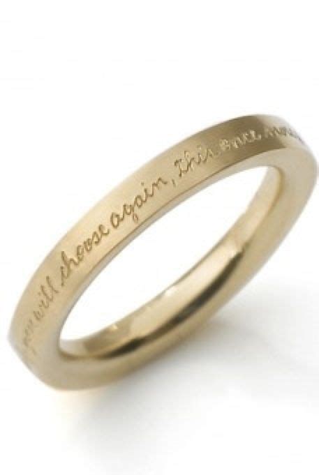 A Yellow Gold Wedding Ring With The Words