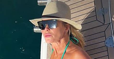 Amanda Holden Shows Off Impeccable Figure As She Strips Down To Skimpy Bikini Celebrity News
