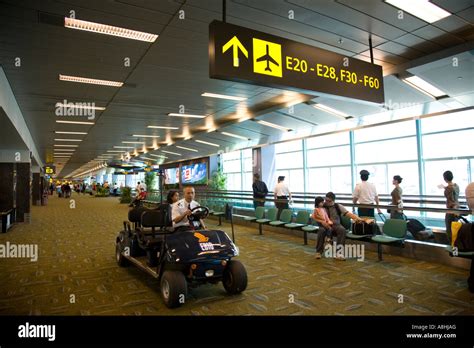 golf cart singapore airport stock photo alamy
