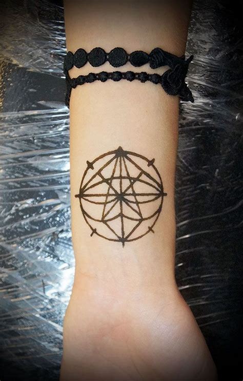 Временное тату символ - фото салона Tattoo Times, узнай цену на сайте.