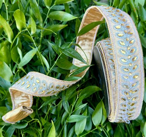 JME heavy wired ribbon. Metallic gold with Jeweled leaf band. 1.5“ x 1