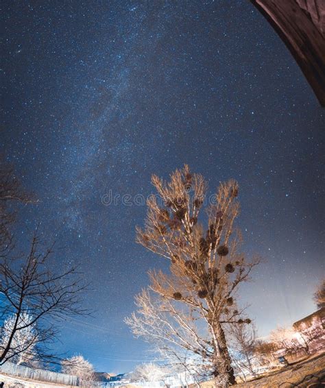Night Starry Winter Sky Over The Village Astro Landscape Stock Photo