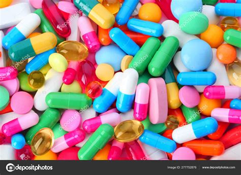 assorted pills  background top view medical treatment stock photo