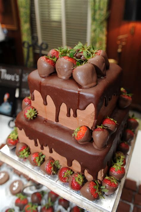 Tiered Chocolate Wedding Cake With Chocolate Strawberries