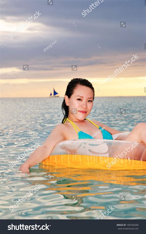 Sexy Brunette Woman Floating On Pool Stock Photo Shutterstock