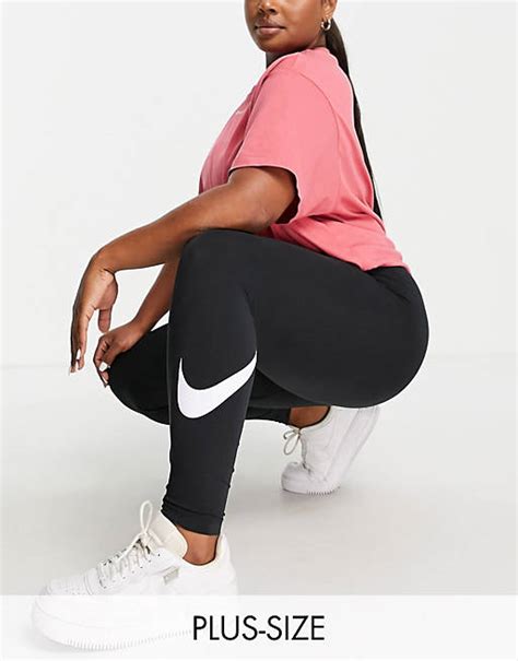 Nike Plus Essential Leggings In Black With Swoosh Print Asos