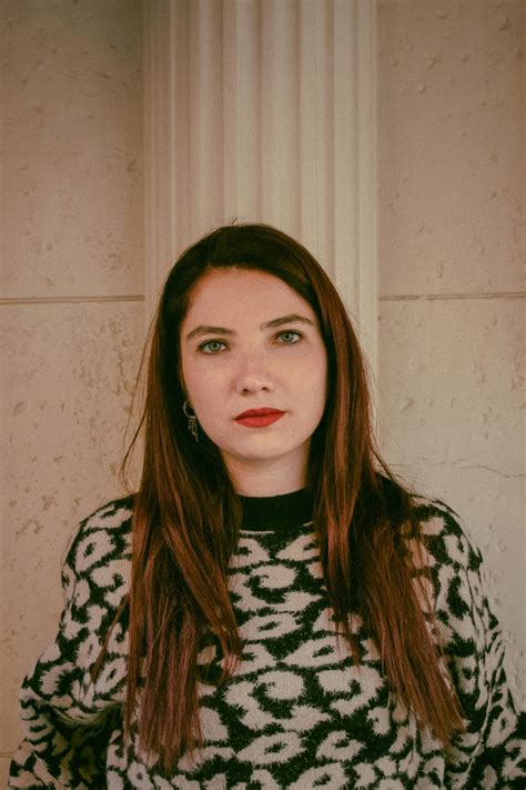 A Woman Wearing Leopard Print Long Sleeves · Free Stock Photo