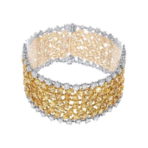 jay feder   tone gold fancy yellow diamond white diamond bracelet