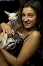 Melena Maria Rya Showing Her Cat While Posing In Black Lingerie Photos