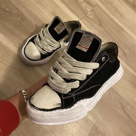 Maison mihara Worn has a little mark in the front... - Depop