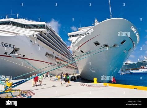 Cruise Ship Passengers On Pier Near Carnival Cruise Ships Triumph And