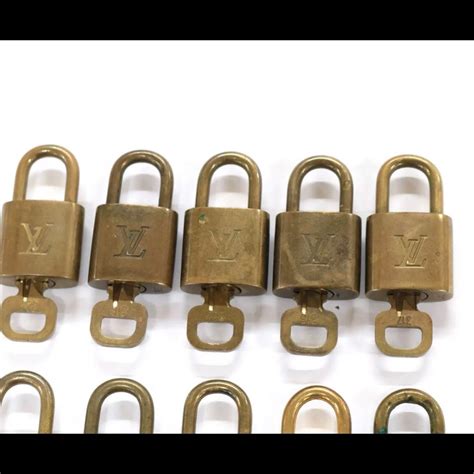 Authentic Louis Vuitton Padlock Key Set Gem