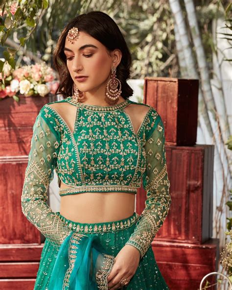 Stunning Green Color Bridal Lehenga And Halter Neck Blouse With Net