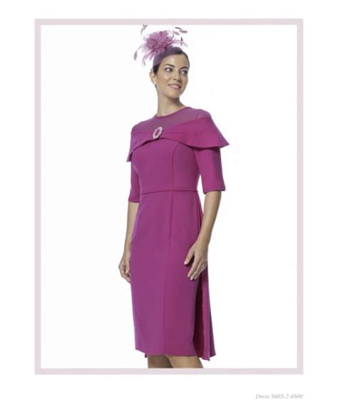 Carmen Melero fushia dress with diamanté broach Marians of Boyle