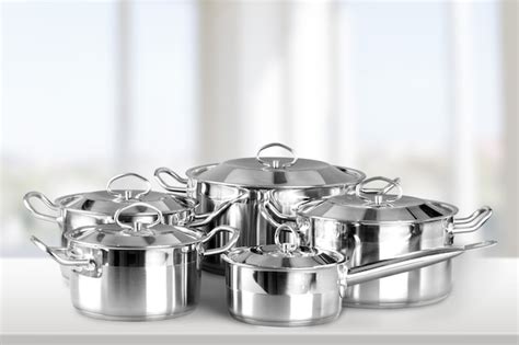 Premium Photo | Stainless steel pots and pans