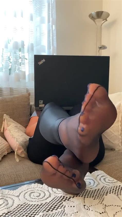 Sexy Amateur Woman Teases With Her Stockinged Feet While Working On The Laptop Feet9