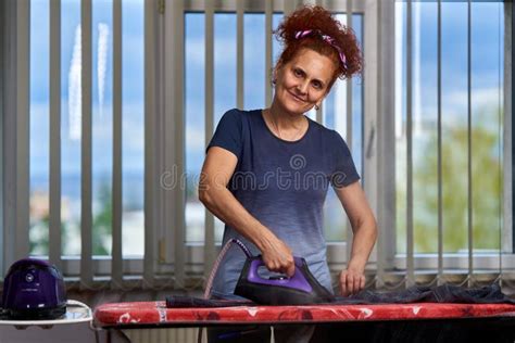 Mature Housewife Ironing Clothes Stock Photo Image Of Headband Mature