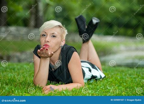 Attractive Blonde Girl Posing In Nature Lying On Grass Stock Image Image Of Srbija Girl