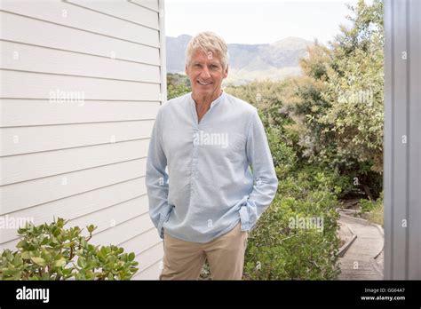 Portrait Of Happy Senior Man Smiling Stock Photo Alamy