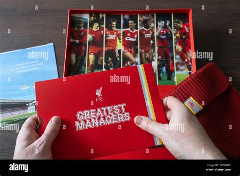 Fan Holding An Lfc Liverpool Football Club Official Membership Pack