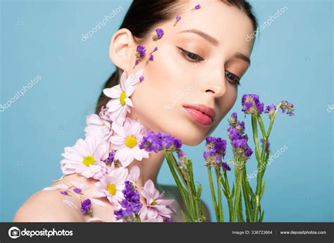 Attractive Naked Woman Looking Blooming Flowers Isolated Blue Stock Photo By IgorVetushko
