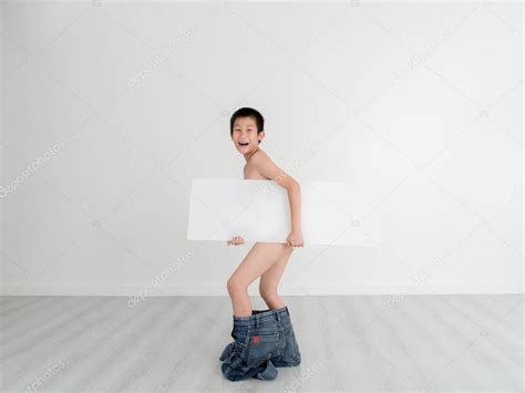 Asian Shy Boy With Underwear Holding Blank White Placard On Gray