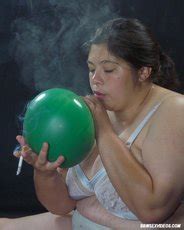 Pretty Bbw Chick Naked And Smoking While Sitting On Balloons Photos