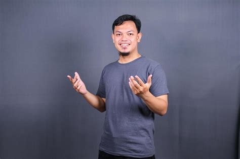 Premium Photo Young Handsome Asian Man Over Gray Background Smiling