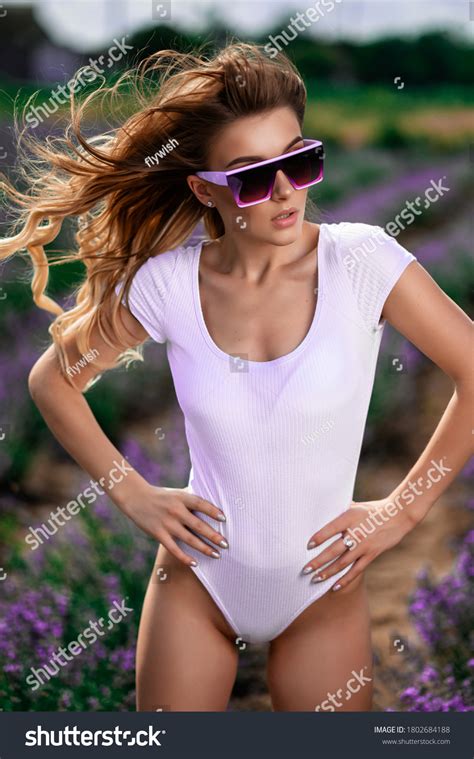 Sexy Blonde Woman White Bodysuit Sunglasses Stock Photo 1802684188 Shutterstock