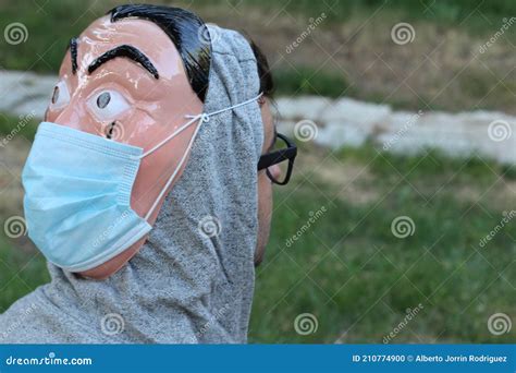 Man Wearing Protective Mask In The Back Of The Head Stock Photo Image