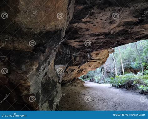 Rock Overhang And A Sandy Floor On The Grand Canyon Track In The Blue
