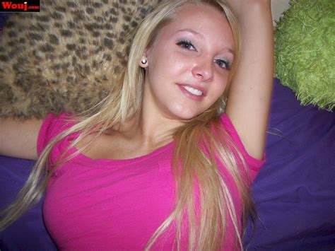 Blonde Sweetie Strips Down And Shows Her Body In Pink Underwear Photos