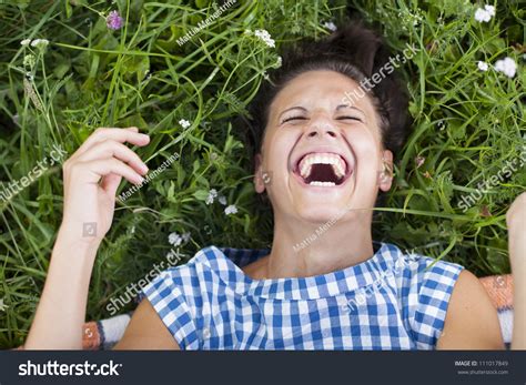 Laughing Girl Lying On A Lawn Rolling On The Floor Laughing Stock