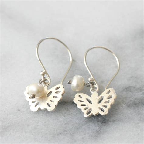 Sterling Silver Butterfly And Pearl Earrings By Magpie Living