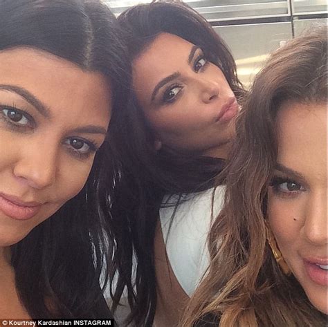 Khloe And Kourtney Kardashian Smile In Instagram Snap While Kim Strikes A Sexy Pout On Set Of