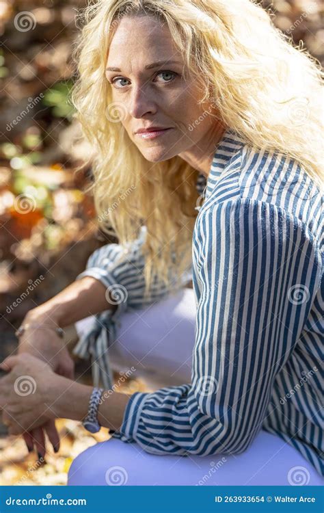 Lovely Blonde Mature Model Posing Outdoors In An Rural Environment Stock Photo Image Of