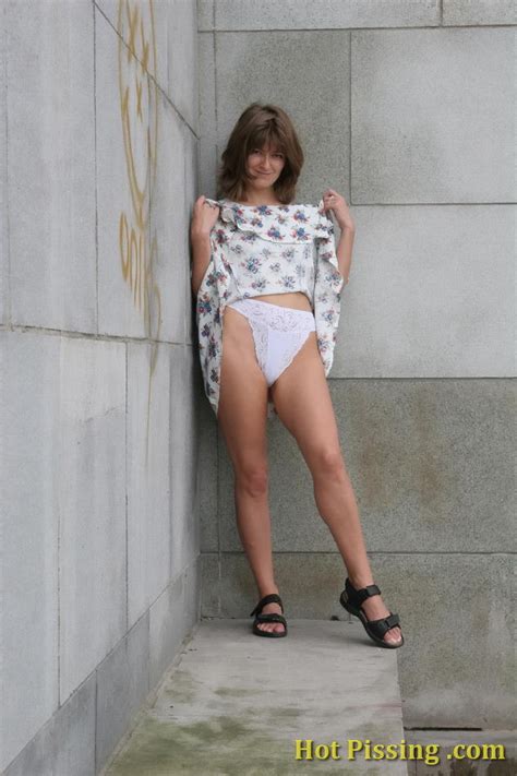 Shameless Chickie Demonstrates Her Pussy And Takes A Leak Outdoors Porn