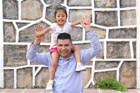 Dad Carries His 4 Year Old Latina Daughter As Piggy Back Spends Quality