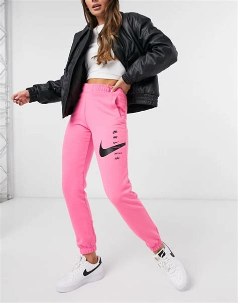 Nike Swoosh Crop And Oversized Jogger Tracksuit In Pink Asos